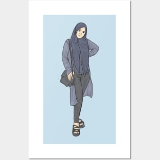 Beautiful woman wearing a hijab wearing a blue shirt with a blue cardigan and tight black trousers Posters and Art